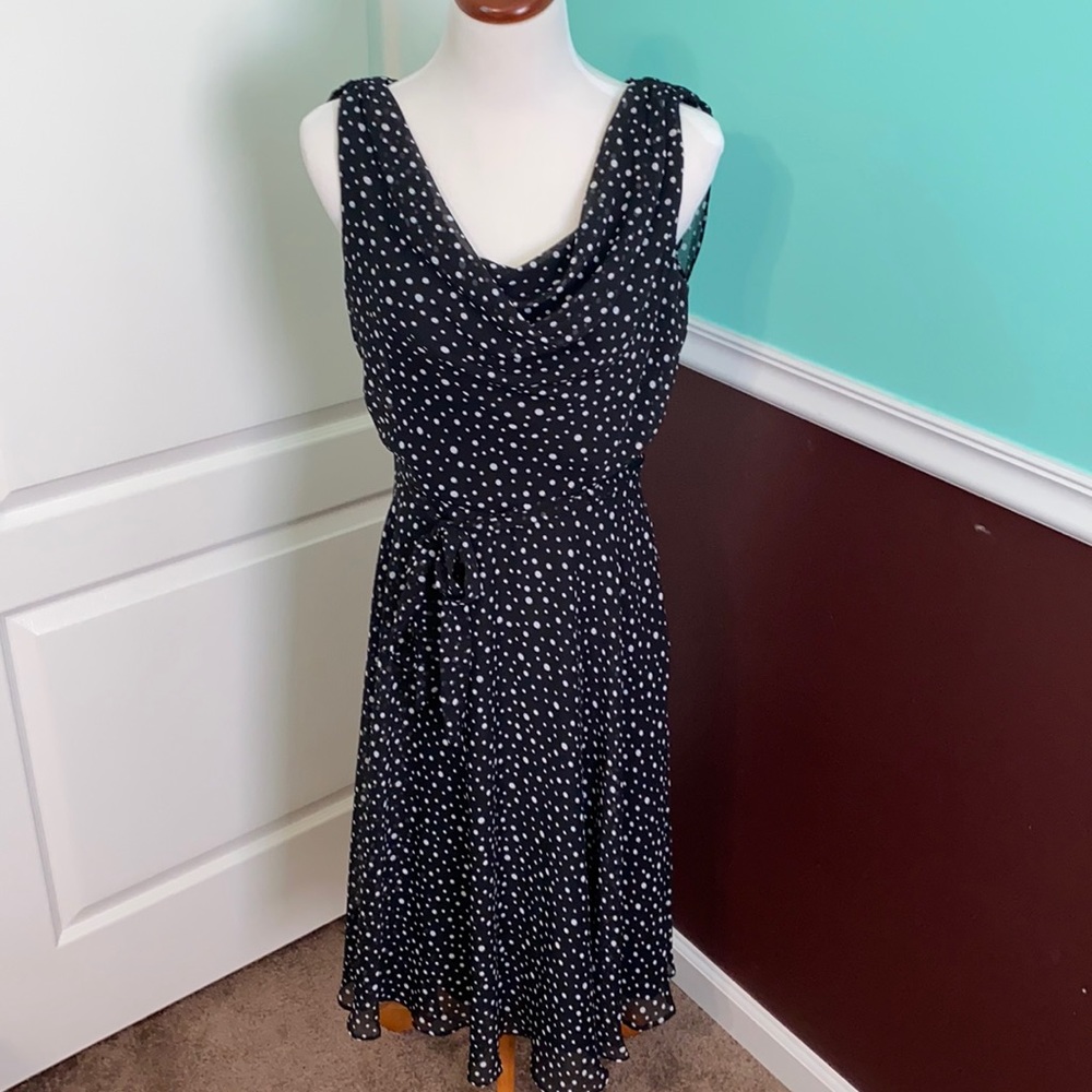 Black and white polka dot sleeveless dress